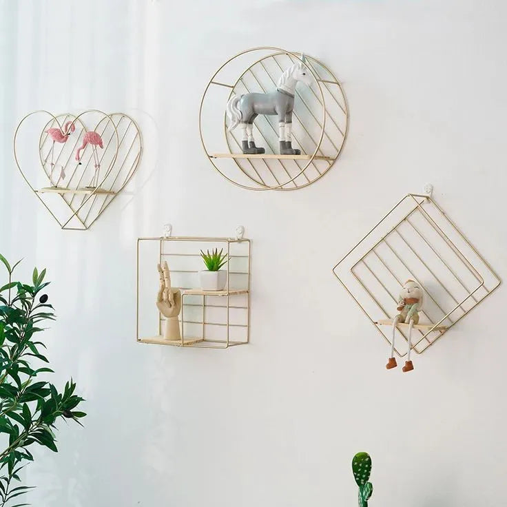 Golden metal wall shelves in heart, circle, square, and diamond shapes for room wall decor in Pakistan