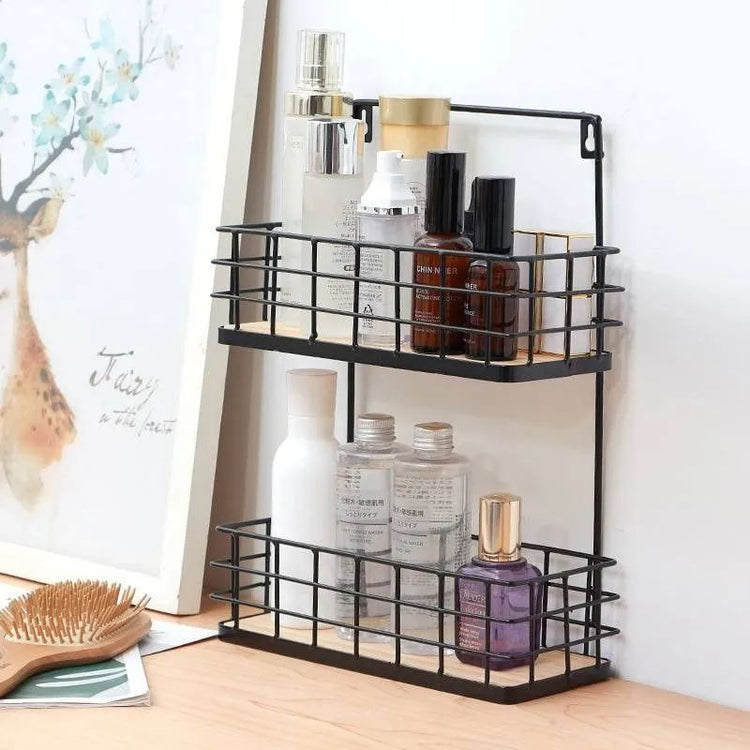 Black metal storage rack with various bottles on a wooden surface.