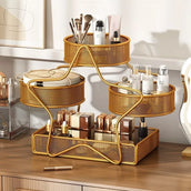 Gold mesh cosmetic organizer with beauty products on a wooden surface.