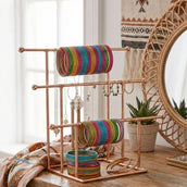 Metal jewelry organizer stand displaying bangles and bracelets