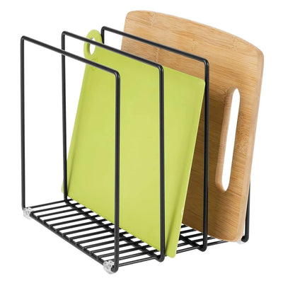 Black cutting board holder with green cutting board and wooden cutting board on a white background