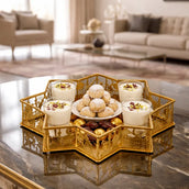 Decorative tray with pastries on a marble table in a living room setting