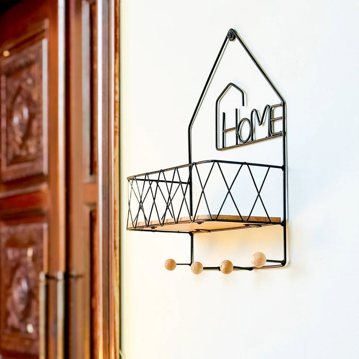 Wall shelf styled with home decor items
