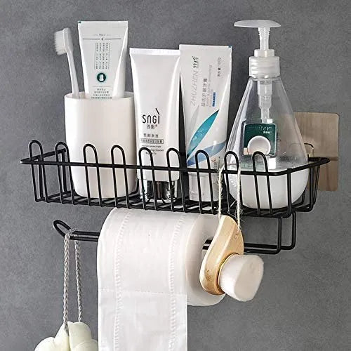 Bathroom shelf with toiletries and toilet paper holder on a gray wall